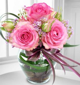 Assorted pink roses and rosebuds make this a simple and thoughtful way to say Be Mine!