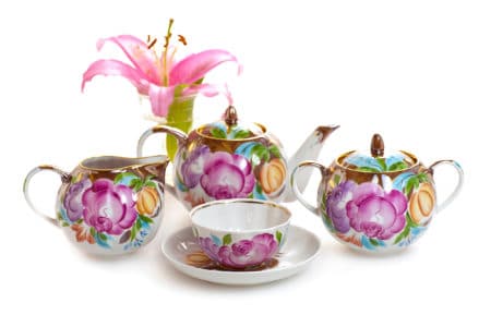 floral teapot on white background